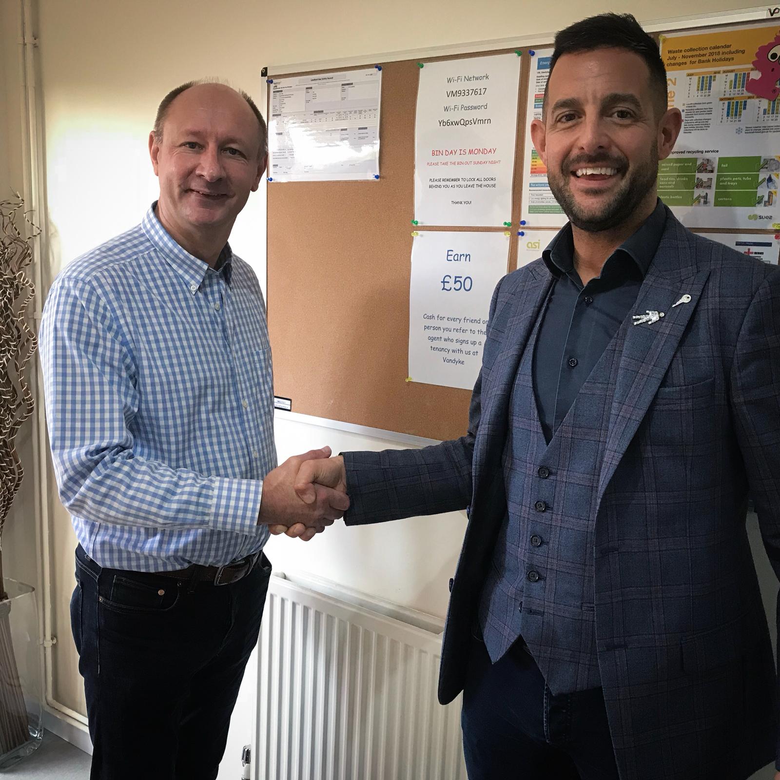 Peter Licourinos with one of his investor mentees